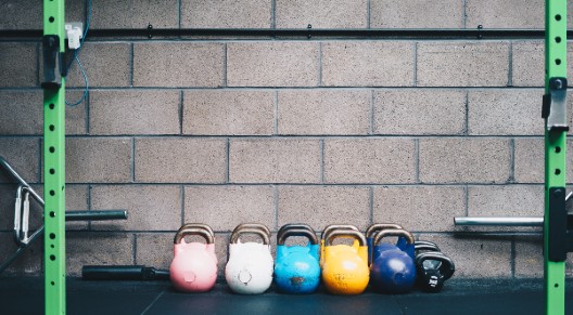 image of rack and kettlebells